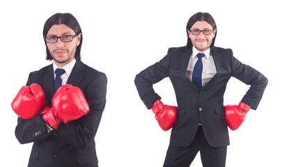 Businessman with boxing gloves on white