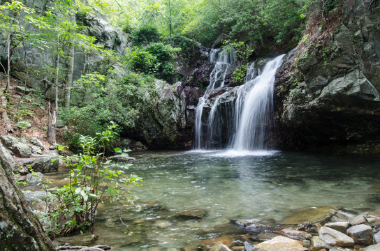 Summertime morning view of a waterfall in the Talladega National Forest near Ashville and Lineville, Alabama, USA