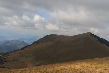 La Covil: a mountain half with trees half naked
