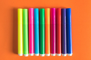 Obraz premium colorful marker on orange background