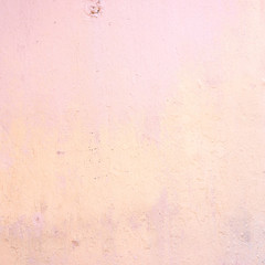 Textures of pastel pink painted grunge concrete background