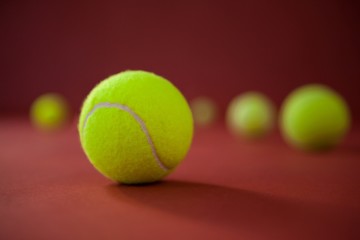 Close up of fluorescent yellow tennis balls
