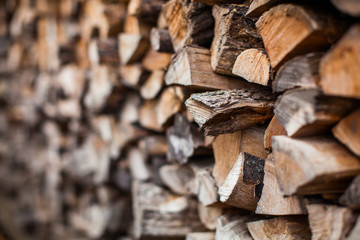 Beautiful Photo background of Heap firewood stack, natural wood for publication in magazine or advertisement
