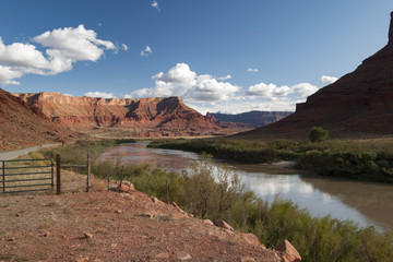Colorado River rolls along Utah Route 128 American Southwest near Moab