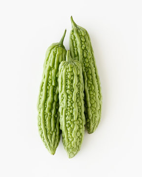 three bitter melons on white background