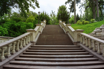 Naklejka na ściany i meble granite steps in the park for rest