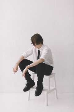 young androgyne on the white background