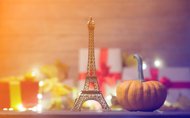 Eiffel tower toy with leaves and pumpkin with Halloween gift