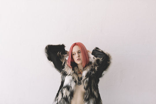 cool young woman with pink hair