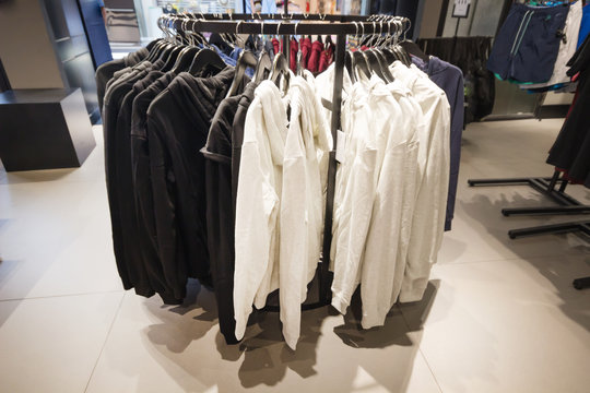 Fashionable jacket clothes in a boutique store ,Shopping fashion in retail store, concept