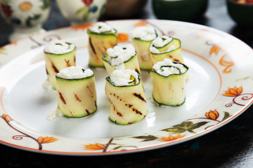 Grilled zucchini rolls filled with cheese