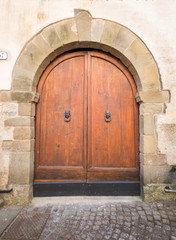 Fototapeta na wymiar Brown wood old door in the museum in Italy, Wood door europe style.