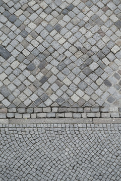 Background from two different patterns of cobblestones