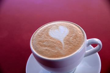 one cappuccino cup on table