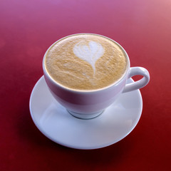 one cappuccino cup on table