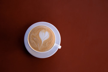 one cappuccino cup on table