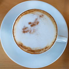 set of coffee, cappuccino in white coffee cup on wood table, coffee time