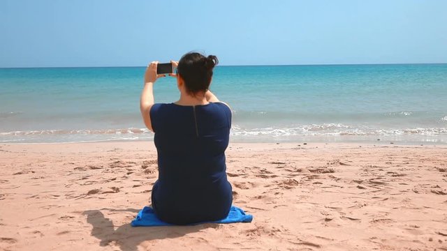 High quality video of woman making the picture on the vacations in real 1080p slow motion 120fps