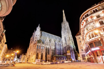 Low angle view of illuminated Saint Stephen's Cathedral during night at Vienna, Austria