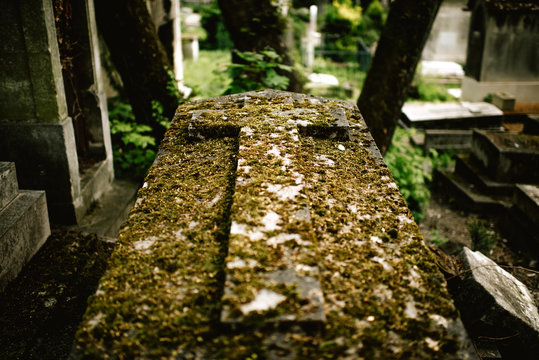 A moss covered tomb
