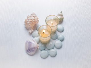 Spa concept on the beach, Spa with candle and starfish shell on with wood background