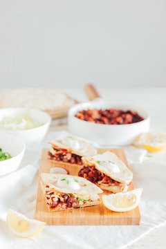 Tacos with azuki beans, salad and yogurt salsa