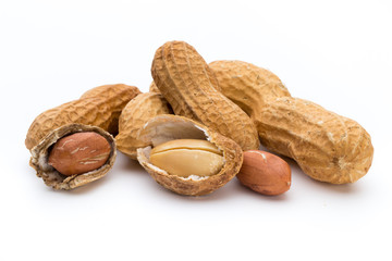 Dried peanuts on the white background.