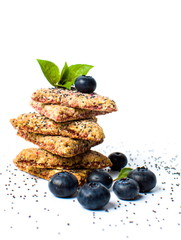 Triangle biscuits with blueberry fruit isolated