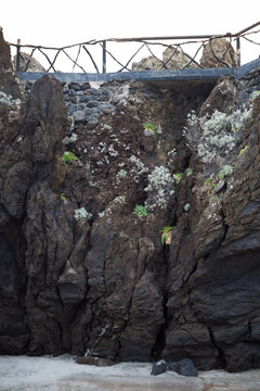 railing on top of rock