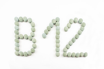 B12 written with pills.