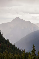 Misty mountain peaks along Red Mountain Pass in Colorado. 