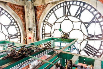  Inside clock tower in old port area with closeup of time wheels levers in city in Quebec region