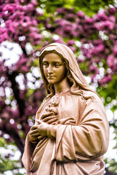 View Of Seminary Golden Statue Of Mary In Garden In Quebec City, Canada