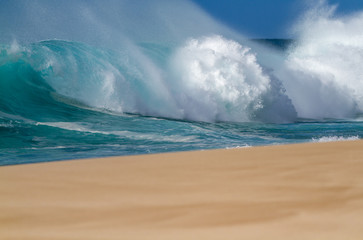 Breaking wave on the north shore of Oahu Hawaii
