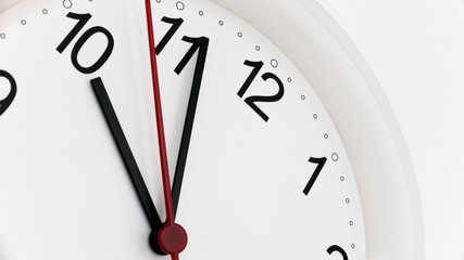 Closeup clock ticking showing ten hours