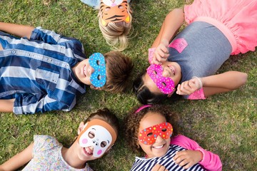 Overhead view of children wearing mask