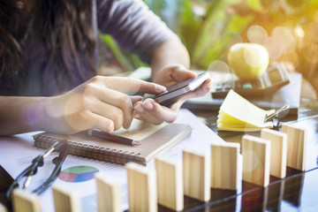 Young business  working with modern devices, digital tablet computer and mobile phone.