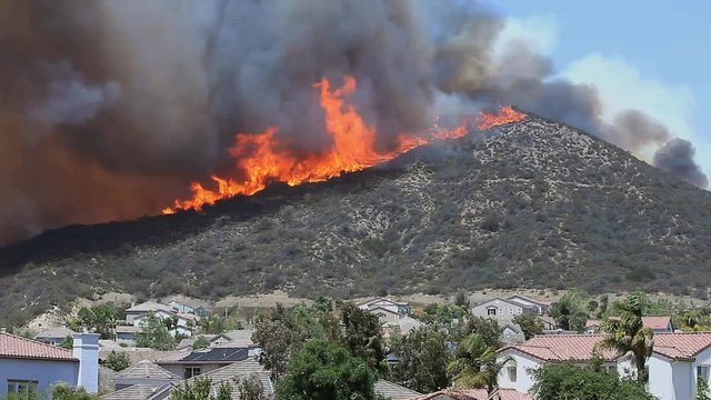 Brush Fire Threatens Homes.