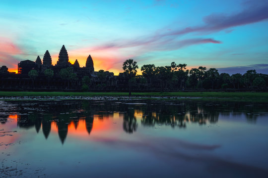 Cambodia  Angkor Wat landmark with reflection in water on sunrise