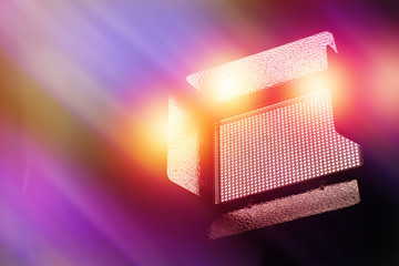 LED light for video and photography production with colorful  blurred background.