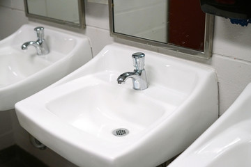 Close up on hand wash sink in the restroom