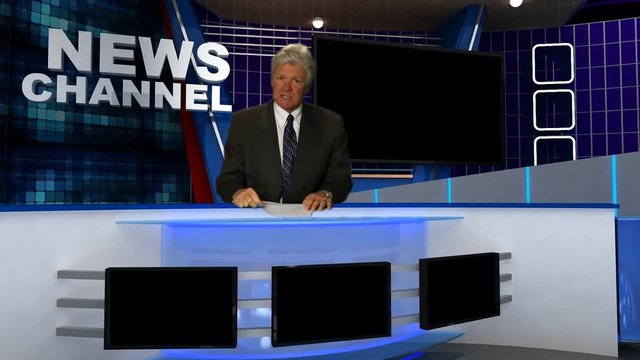 News Broadcaster Reads Copy in the Studio.