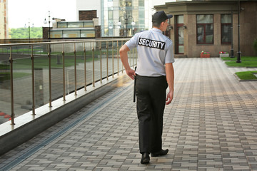 Male security guard, outdoors