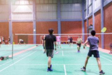badminton court with blurred background woman playing badminton - obrazy, fototapety, plakaty
