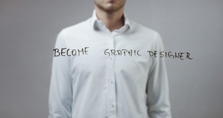 Become graphic designer , Man Writing on Glass