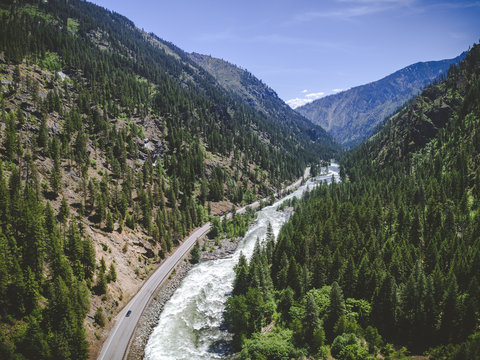 Aerial of Scenic Wilderness Highway by Mountain River