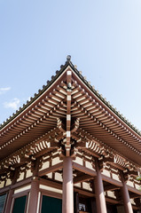 Fototapeta na wymiar Wooden rooftop in the buddhism temple in Fukuoka prefecture