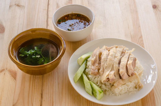 Hainanese chicken rice or rice cooked in chicken broth