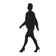Fototapeta na wymiar Business woman walking, side view. Vector silhouette