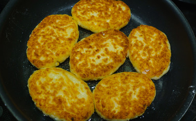 pancakes from cottage cheese, baked in a frying pan.
